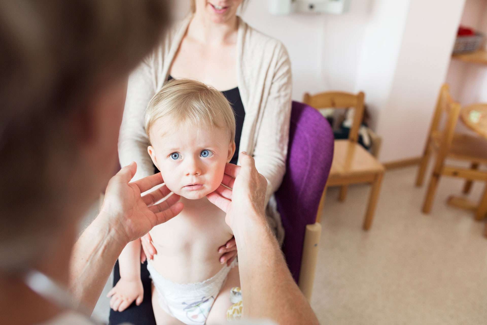 Toddler getting a check-up.