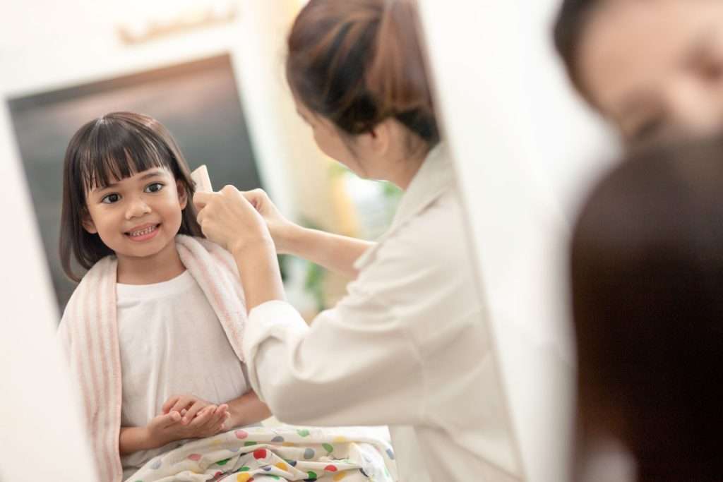 Mother and daughter preparing for a doctor appointment.