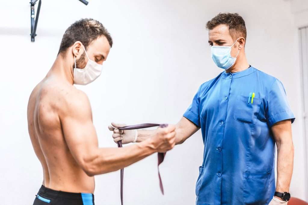 Athlete doing sports physical.