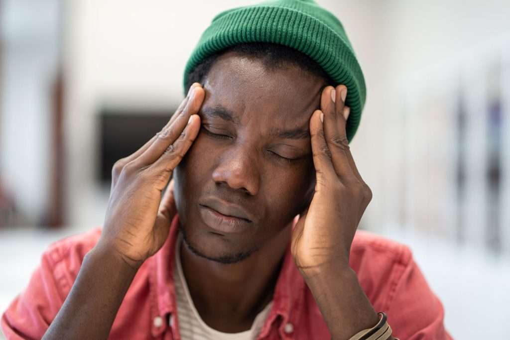 Man with migraines and headaches.