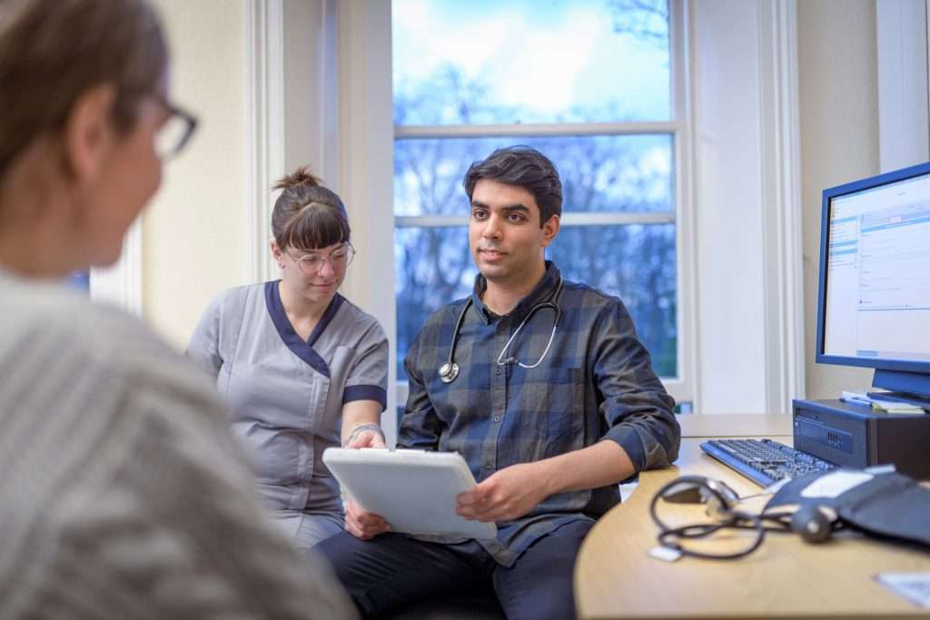 Doctor and patient talking.